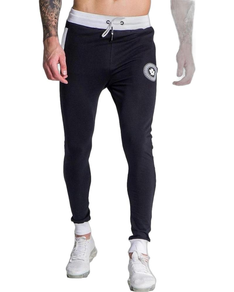 GIANNI KAVANAGH PANTALON CON LOGO MECANICO NEGRO GIANNI KAVANAGH PANTALON CON LOGO MECANICO NEGRO
