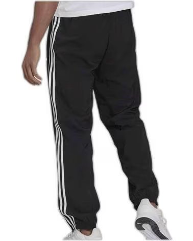 ADIDAS PANTALONI SPORTIVI ADIDAS ESSENTIALS 3 STRISCE DA UOMO MULTICOLOR