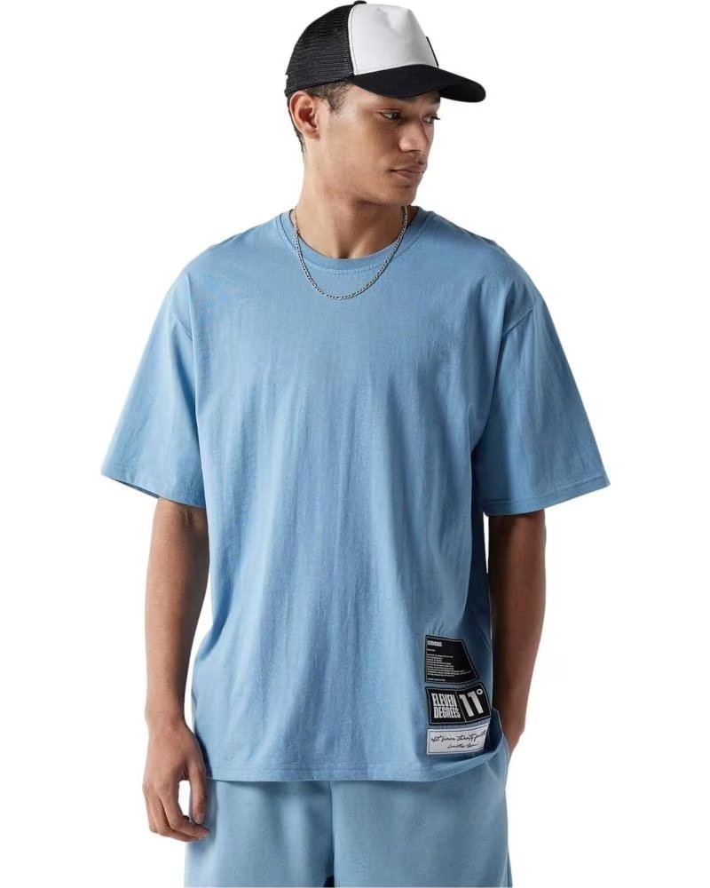 11 DEGREES 11 DEGREES VARSITY GRAPHIC T-SHIRT BLUE AZUL