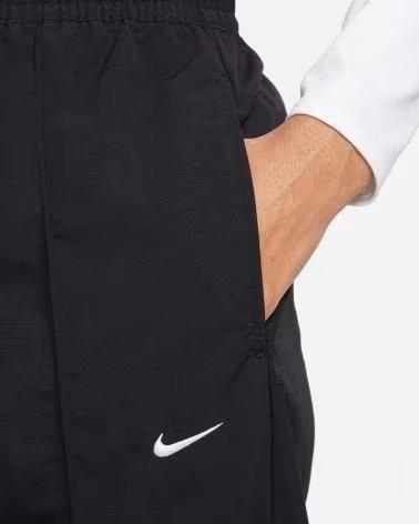 NIKE PANTALON MUJER EVERYTHING WOVENS FQ3588 NEGRO