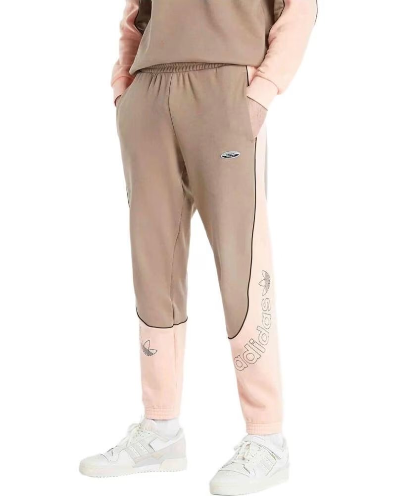 ADIDAS PANTALON LARGO EN PARA UNISEX MARRON
