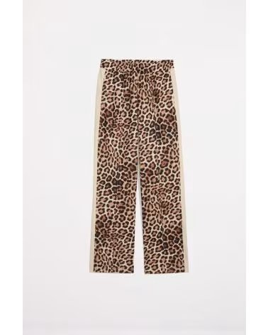PUMA PANTALÓN ESTAMPADO ANIMAL PRINT CON BANDAS LATERALES BEIGE