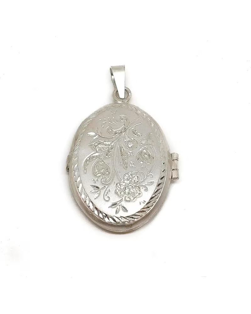 MINOPLATA GUARDAPELOS OVALADO EN PLATA DE LEY TALLADA 28 X 38 MM