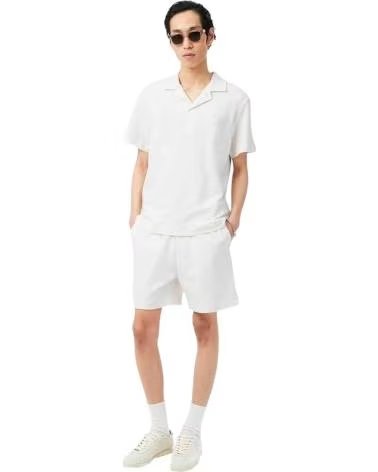 LACOSTE CAMISETA DE MANGA CORTA POLO CLASSIC FIT TEXTURED MANGA CORTA BLANCO EN BLANCO PARA HOMBRE PURO
