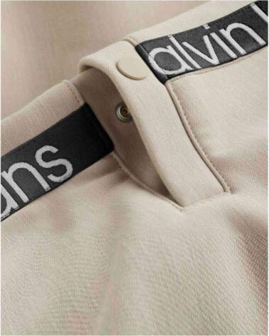 CALVIN KLEIN PANTALÓN JOGGER UNISEX CUT OFF LOGO BEIGE