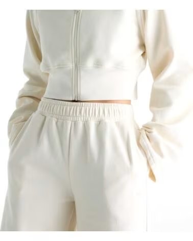 NEW BALANCE PANTALONES BRUSHED COASTAL FLEECE PANT WB6220LW BEIGE