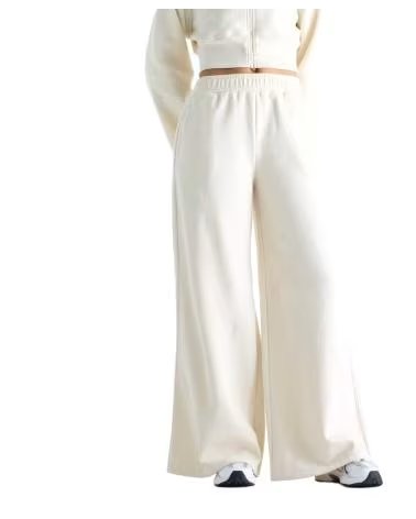 NEW BALANCE PANTALONES BRUSHED COASTAL FLEECE PANT WB6220LW BEIGE